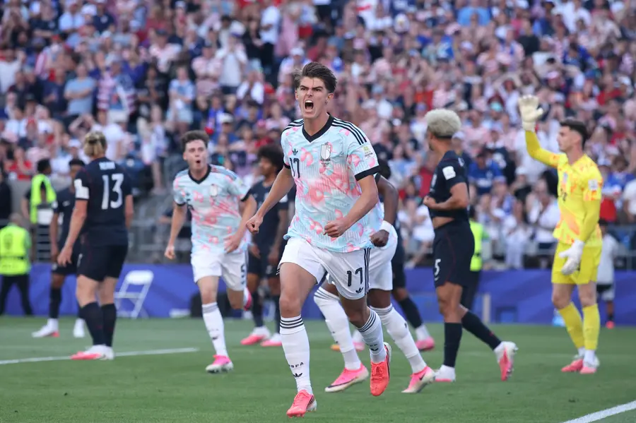 Charles De Ketelaere celebrates after scoring his team's first goal