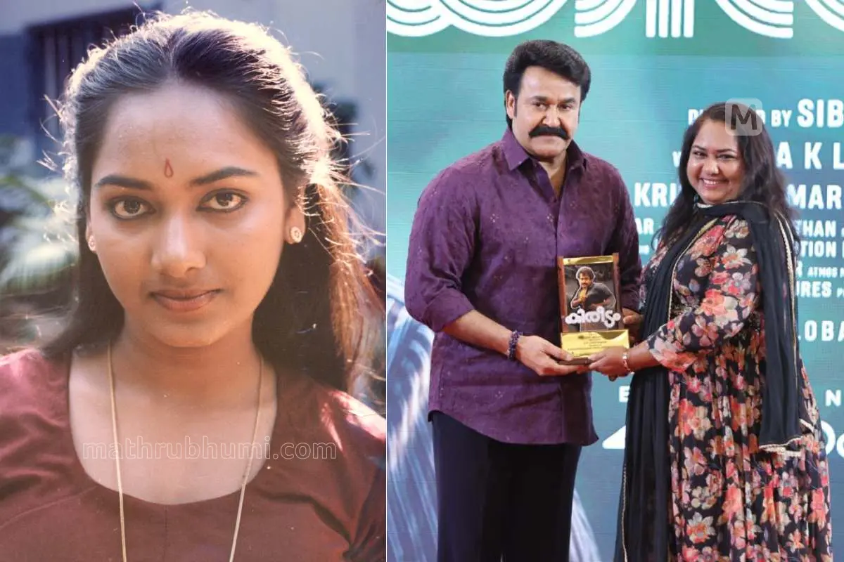 ഉഷ, മോഹൻലാലിൽനിന്നും ഉപഹാരം സ്വീകരിക്കുന്നു