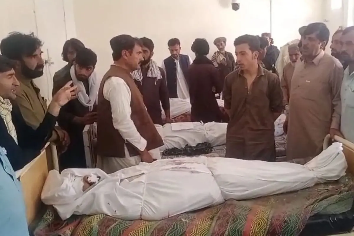 Relatives gather around the body of a slain policeman at a hospital in Ziarat, in Balochistan province, on July 7, 2026. Gunmen killed nine police officers, and others are missing, following an attack on a checkpost at a dam project in Pakistan's restive southwestern Balochistan province, officials said on July 7. (Photo by AFP)