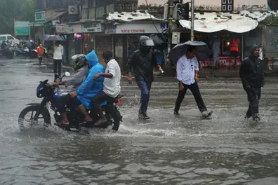 Mumbai rains: IMD predicts heavy downpours, strong winds for July 8; rail services disrupted