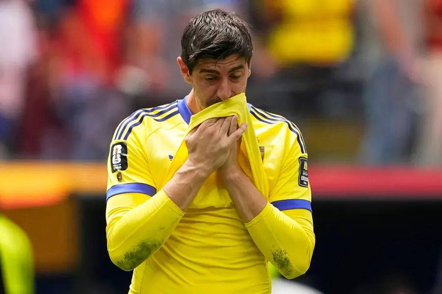Belgium goalkeeper Thibaut Courtois reacts after their loss in the World Cup quarterfinal match match between Spain and Belgium