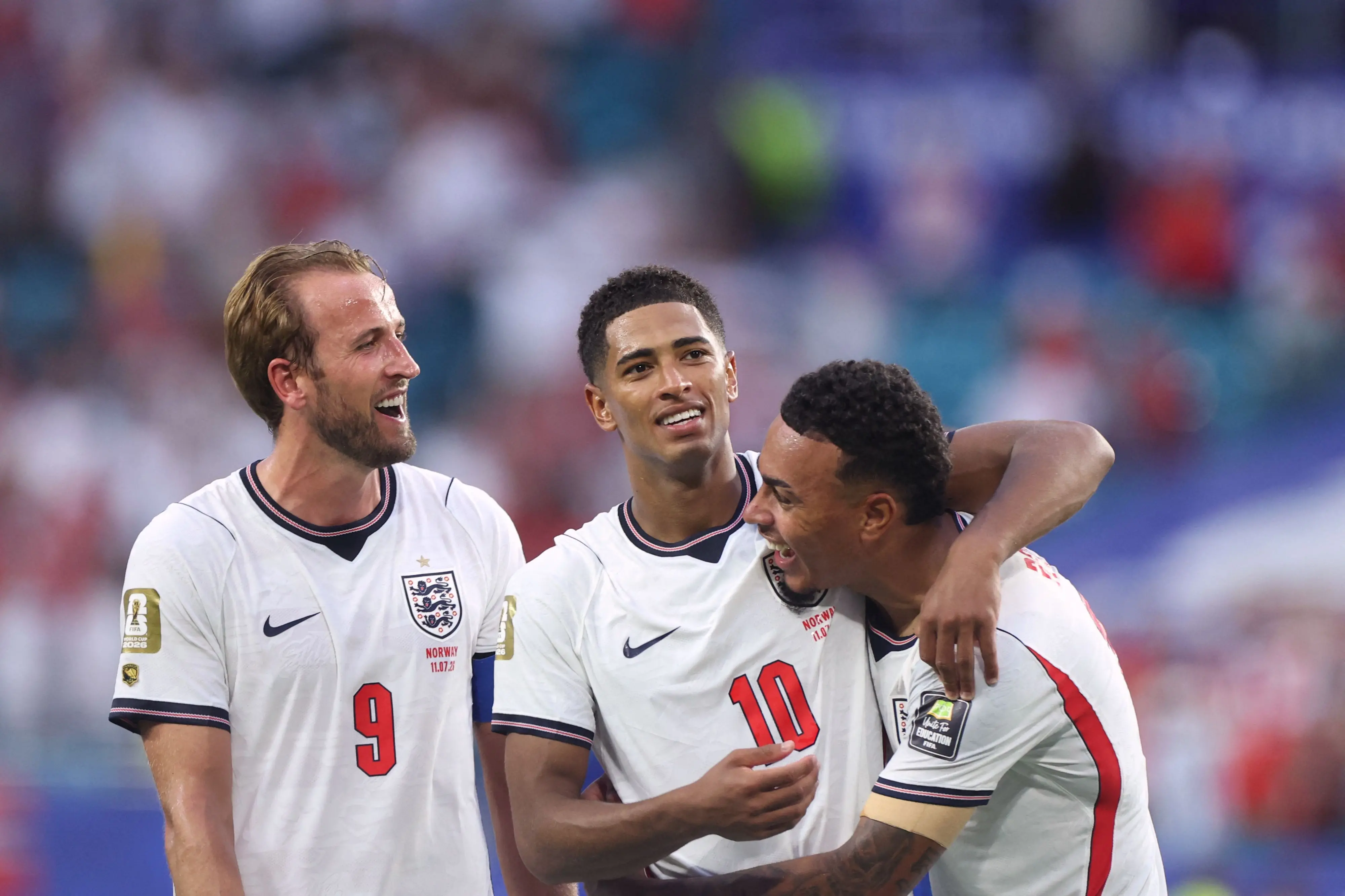 England's forward Harry Kane, midfielder Jude Bellingham and England's midfielder Morgan Rogers celebrate after winning the 2026 World Cup football tournament quarter-final match | AFP