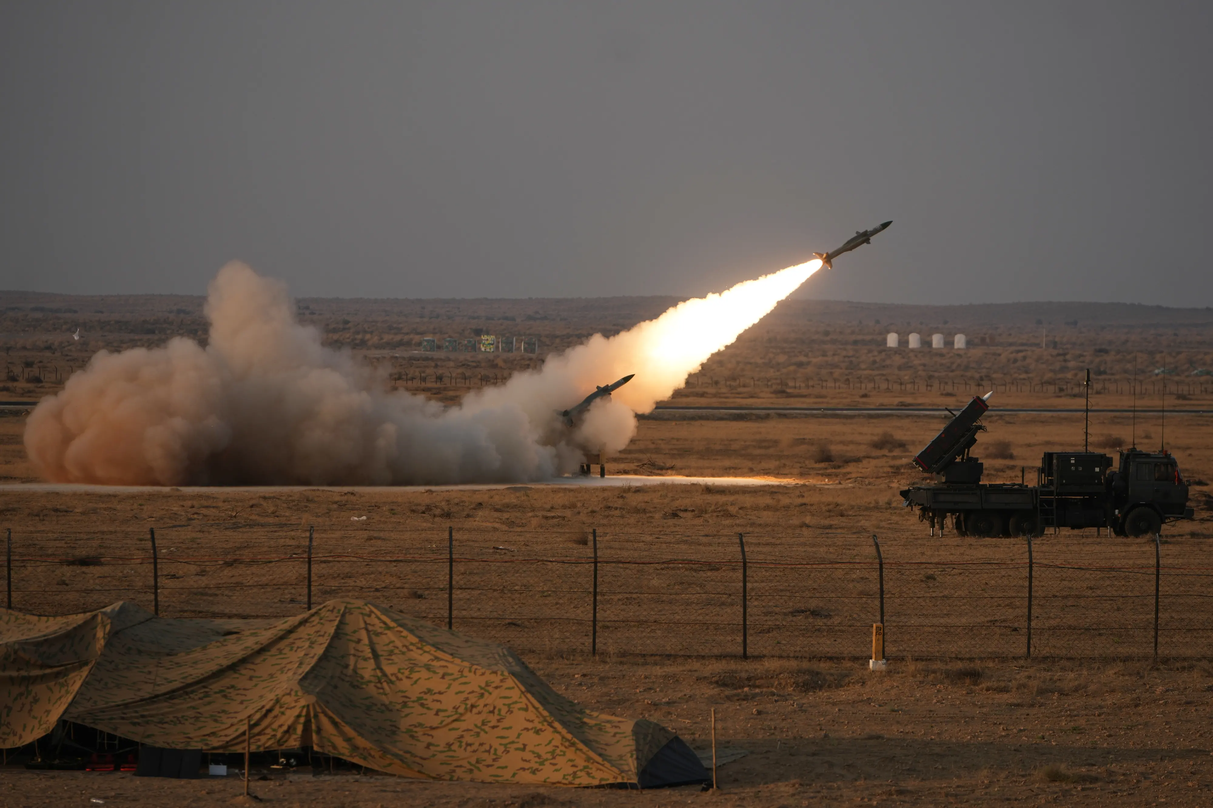 An Indian medium-range mobile Surface-to-Air Missile, Akash, is launched towards a simulated target during a rehearsal for the Vayu Shakti-2026 air exercise ("Air Power") at the Pokhran Air to Ground Range near Jaisalmer, in the western Indian state of Rajasthan.| Photo: AP