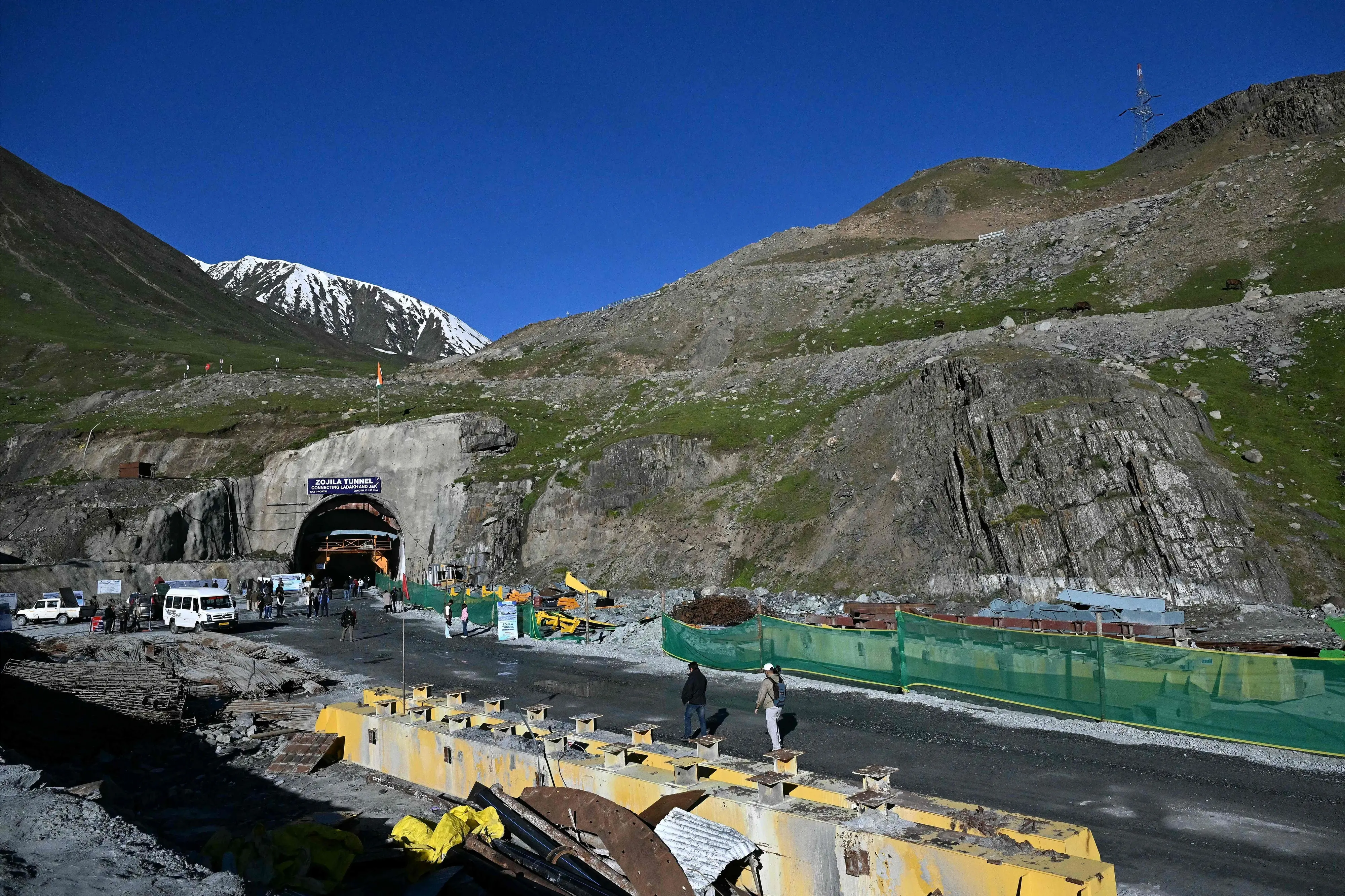 Mediapersons walk at the Zojila tunnel, India's longest road tunnel project connecting Jammu and Kashmir state with the Ladakh region on June 9, 2026.| Photo: AFP