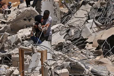 12 killed in Israeli strikes across Gaza, including six police officers