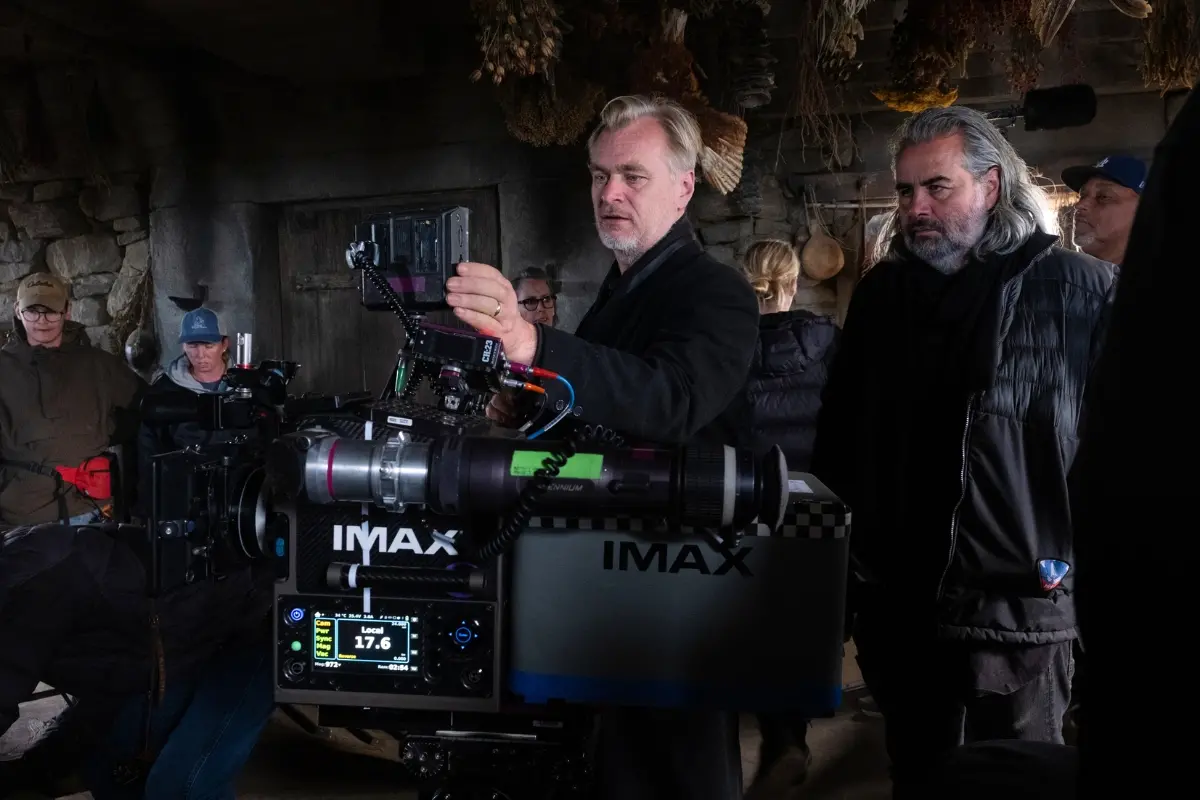 Director Christopher Nolan, center, with cinematographer Hoyte van Hoytema on set of "The Odyssey." | Photo: Universal Pictures via AP