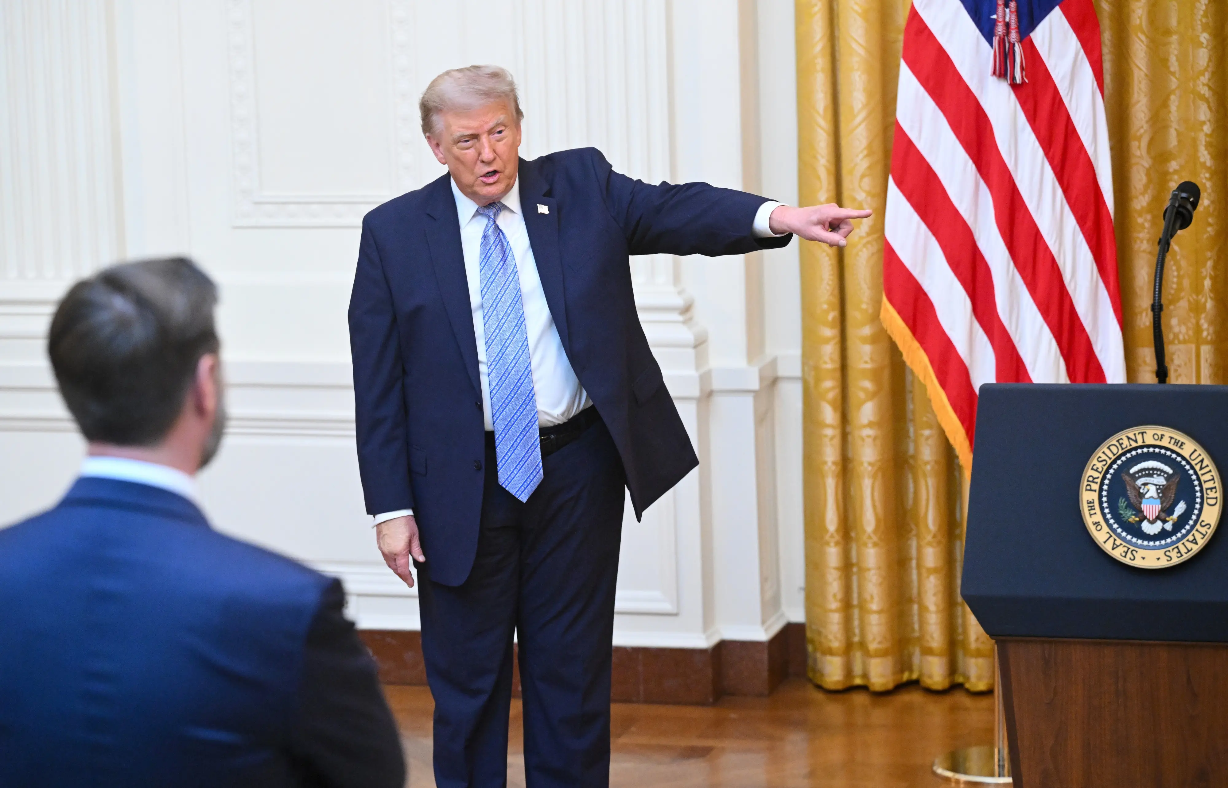 President Donald Trump gestures after speaking in the East Room of the White House | AP