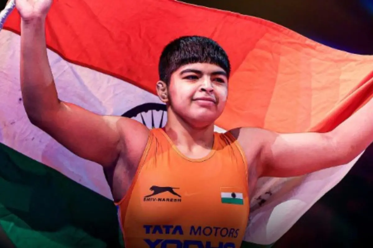 Neha celebrates with the Indian flag after winning the women's 59kg gold medal at the Polyák Imre, Varga János and Kozma István Memorial Senior Ranking Tournament 2026 in Budapest, Hungary.