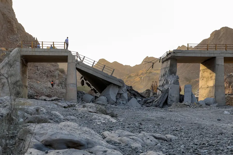 A heavily-damaged bridge which was hit by a US strike