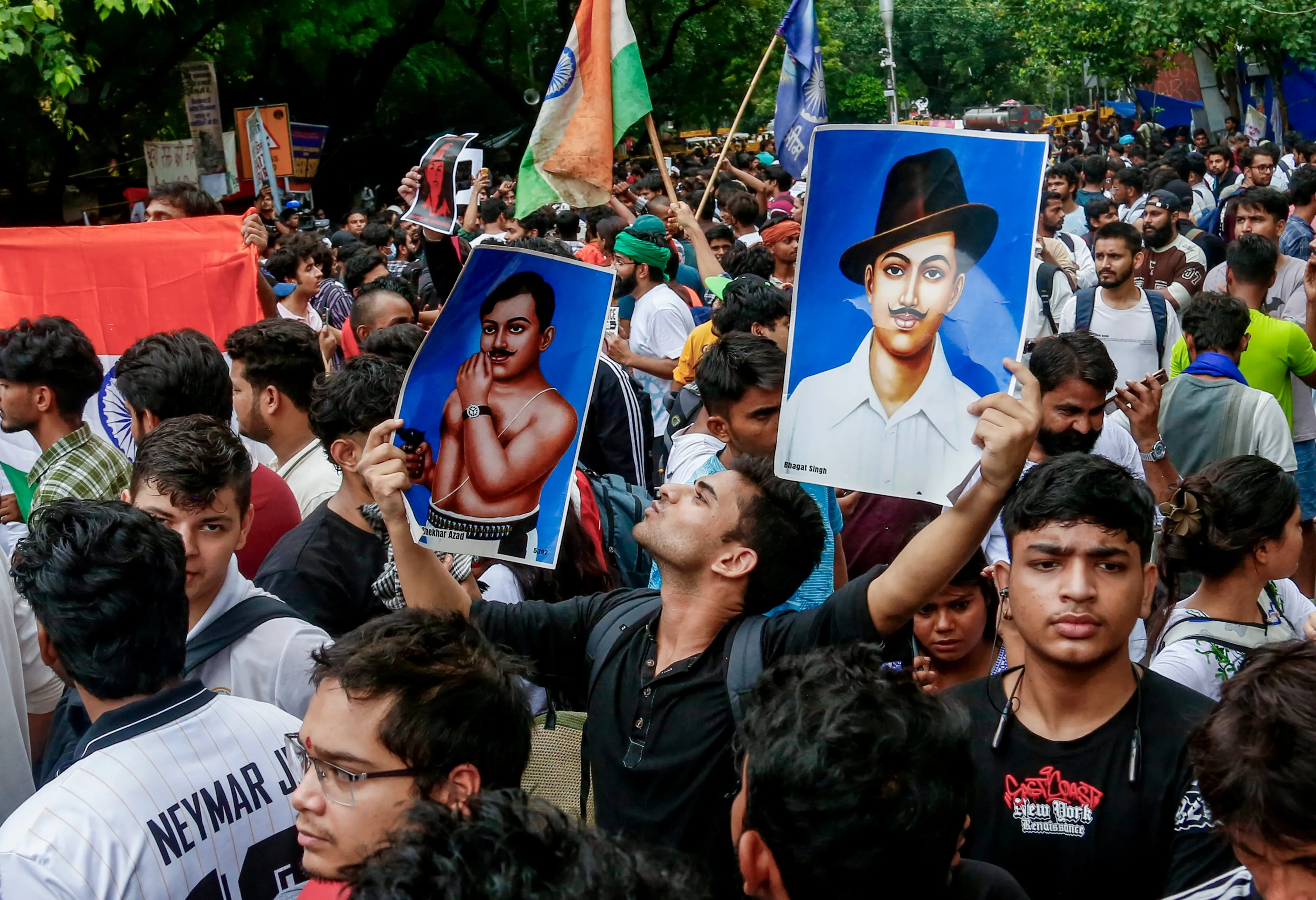 Cockroach Janata Party (CJP) supporters gather during a protest demanding the resignation of Union Education Minister Dharmendra Pradhan | PTI
