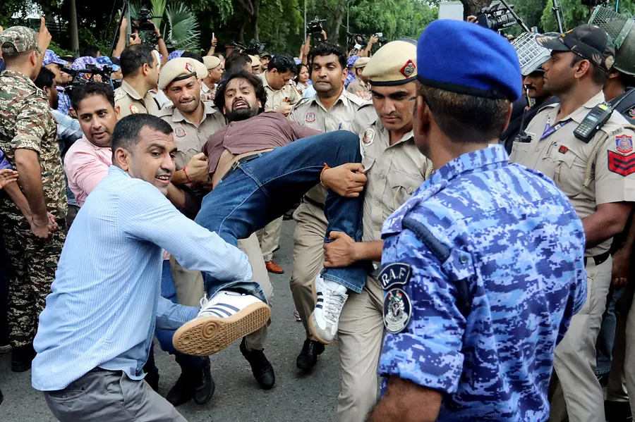 Delhi police detain Congress workers protesting outside the PM's residence at Lok Kalyan Marg