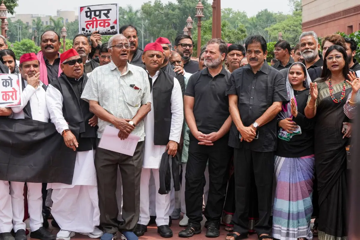 Leader of Opposition in Lok Sabha Rahul Gandhi, Congress MP KC Venugopal, Samajwadi Party (SP) MPs Akhilesh Yadav, Dharmendra Yadav and Awadhesh Prasad, TMC MP Saugata Roy, JMM MP Mahua Maji and other opposition leaders stage a protest wearing black clothes to express solidarity with students protesting against the NEET paper leak issue, during the Monsoon session of Parliament, in New Delhi, Wednesday, July 22, 2026 (Photo: PTI)