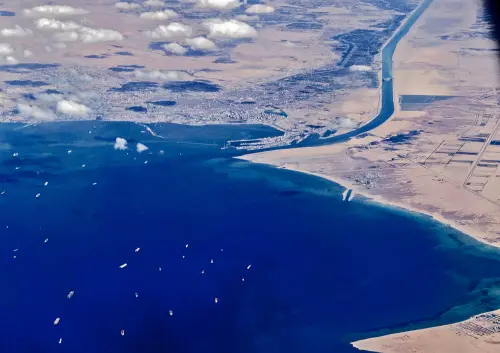 Stranded ships waiting in queue in the Gulf of Suez to cross the Suez Canal at its southern entrance near the Red Sea port city of Suez | AFP