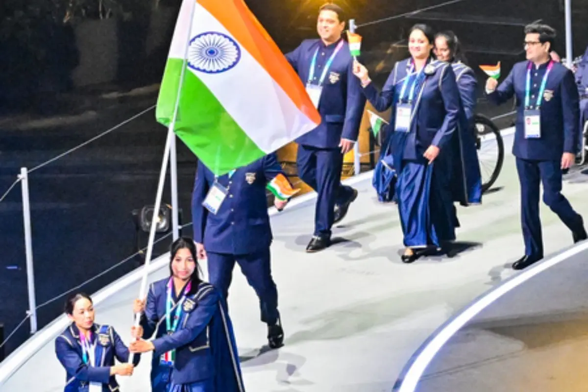 India's flag-bearers Mirabai Chanu and Lovlina Borgohain lead the national contingent during the Parade of Nations at the opening ceremony of the Commonwealth Games 2026 in Glasgow on Thursday. (IANS Photo)