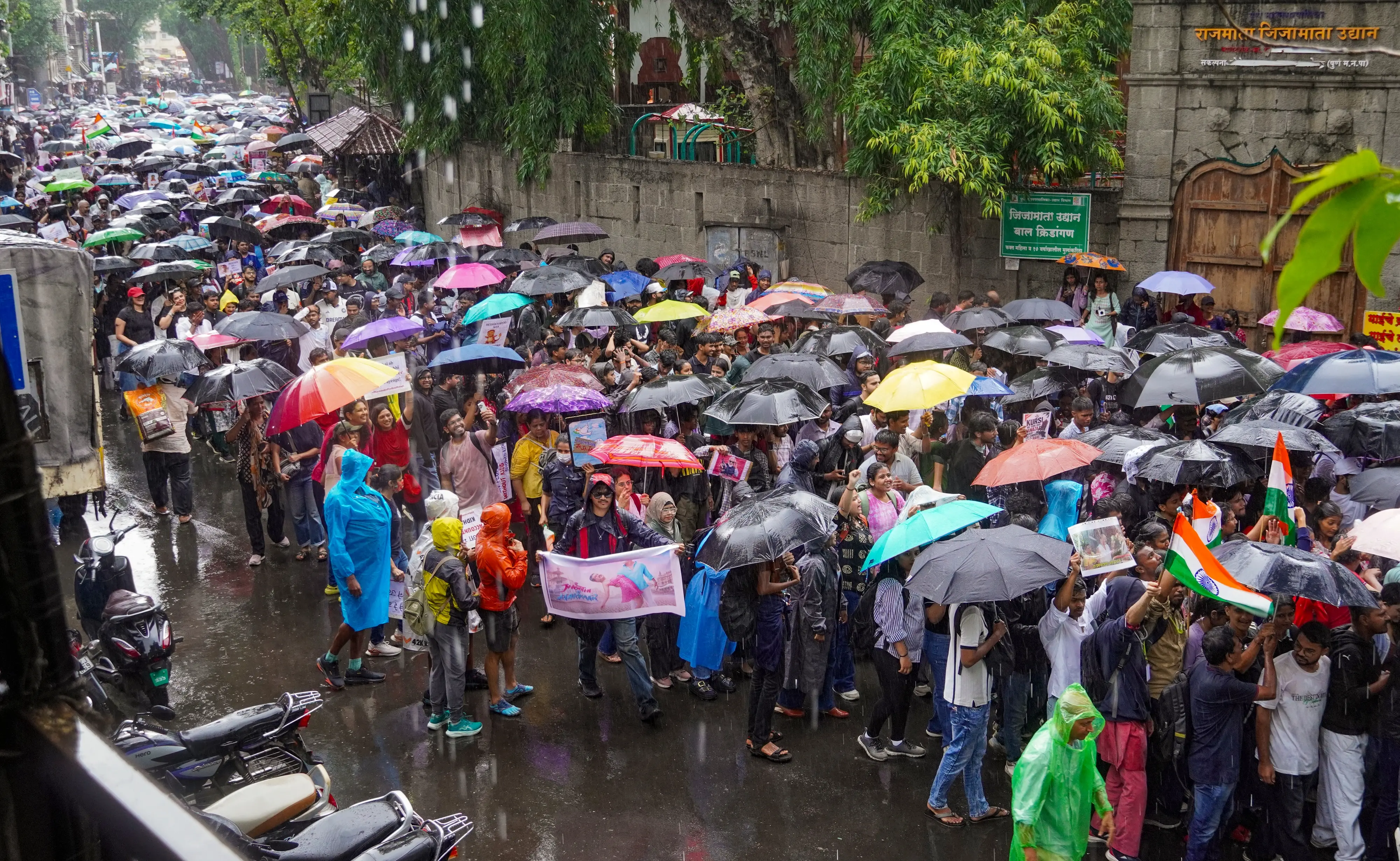 Students and youth activists participate in a Cockroach Janta Party (CJP)-led protest march from Shaniwar Wada to the District Collector's Office against the alleged NEET-UG paper leak and examination irregularities, in Pune.| Photo: PTI