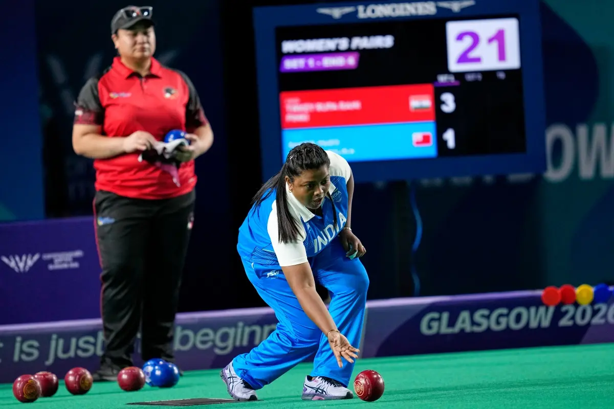 India's Rupa Rani Tirkey bowls as she plays against Tonga during Women Pairs Bowls match at the Commonwealth Games in Glasgow, Scotland | Photo: AP
