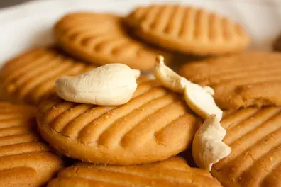 150 gm on Parle biscuit pack, 125 gm inside; Kannur man awarded ₹50,000 compensation