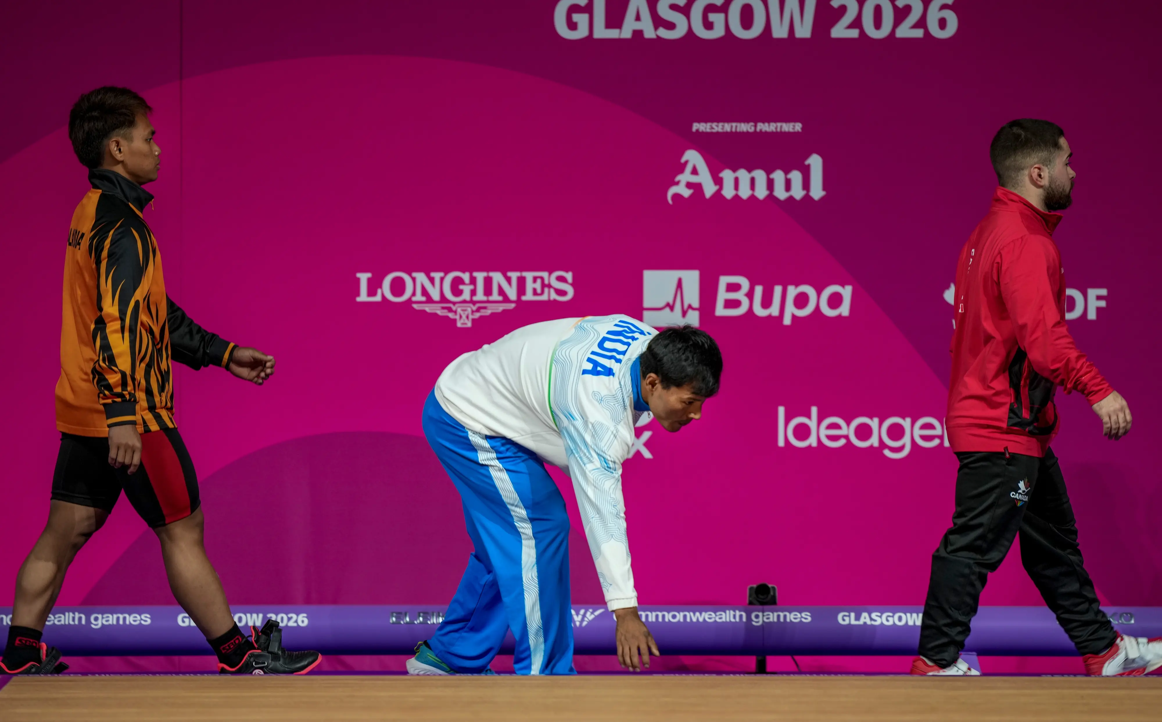 Rishikanta Singh, centre, competes in the men's 60 kg Weightlifting event at the Commonwealth Games 2026 | PTI