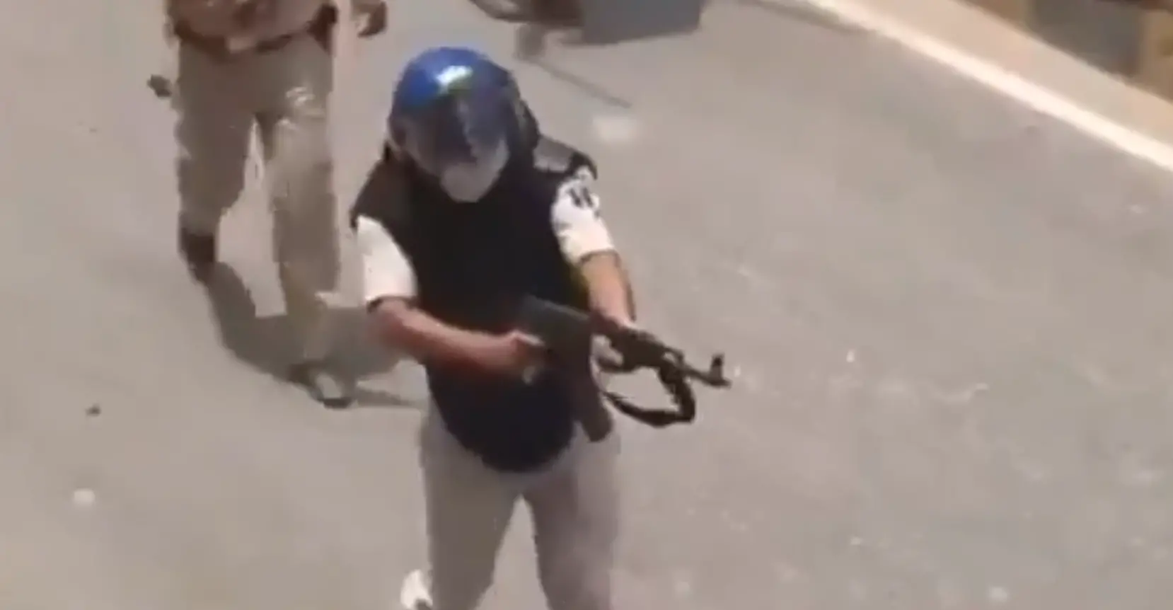 The cop was seen firing an AK-47 during a student protest | Photo: X/@CJP_is_back