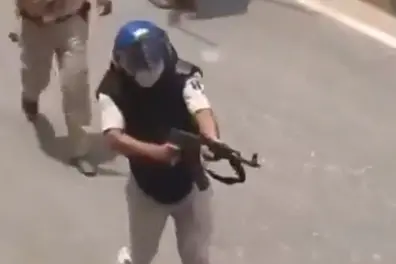 Cop suspended after video shows him firing AK-47 during Bihar student protest