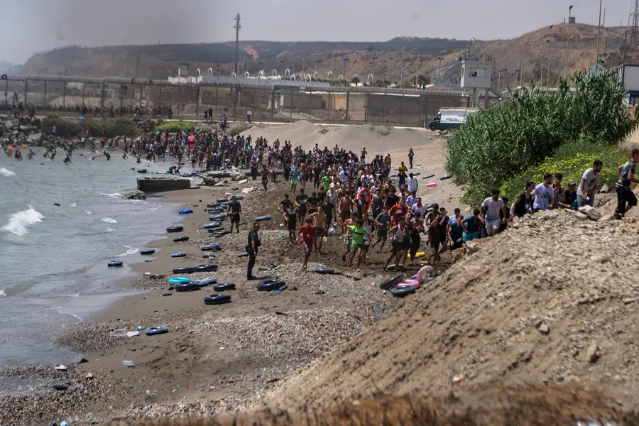 18 migrants dead as thousands breach Morocco–Spain Border