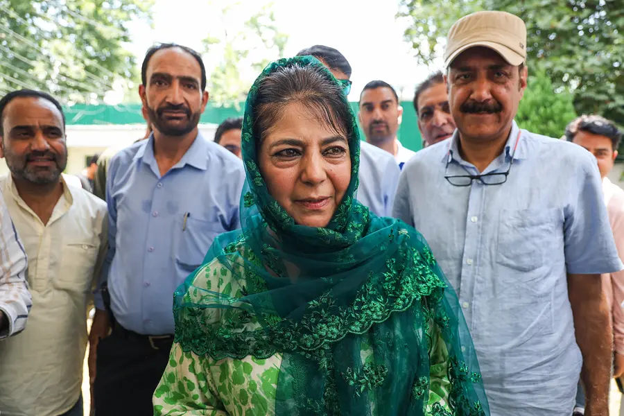 PDP Chief Mehbooba Mufti arrives to address a press conference in Srinagar