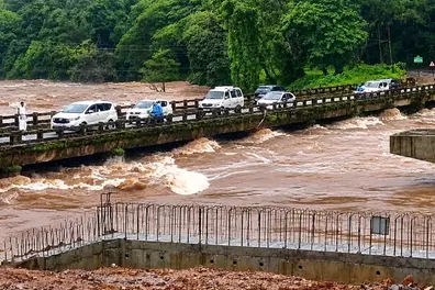 Three dead as Karnataka rain triggers landslide; rail services affected