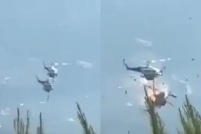Mid-air collision: Two firefighting helicopters crash while battling wildfire near Athens | VIDEO