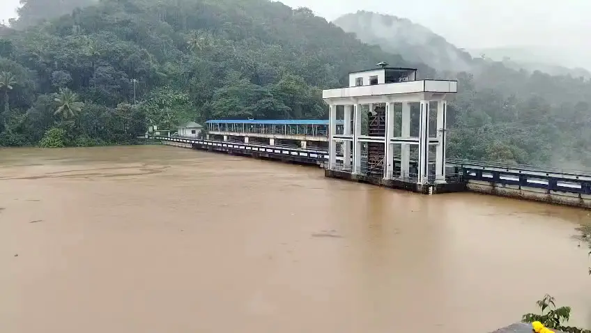 A view of the excess water of the Periyar River, which has risen up to six feet due to heavy rainfall at the water reservoir, in Idukki