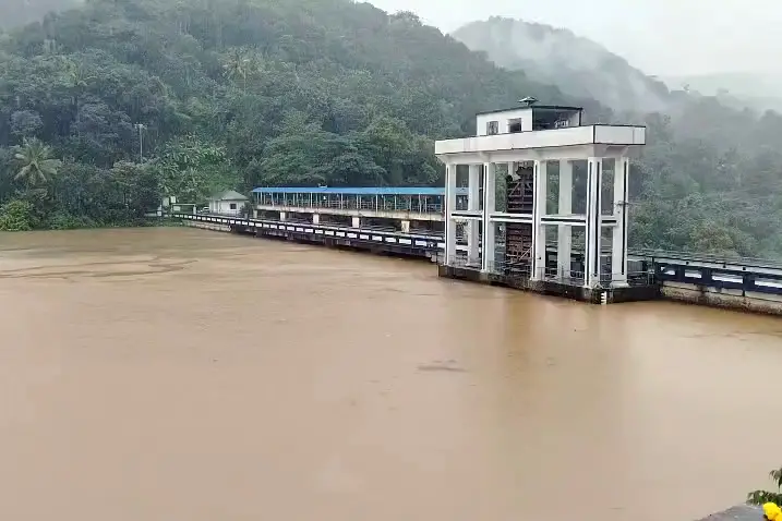 A view of the excess water of the Periyar River, which has risen up to six feet due to heavy rainfall at the water reservoir, in Idukki