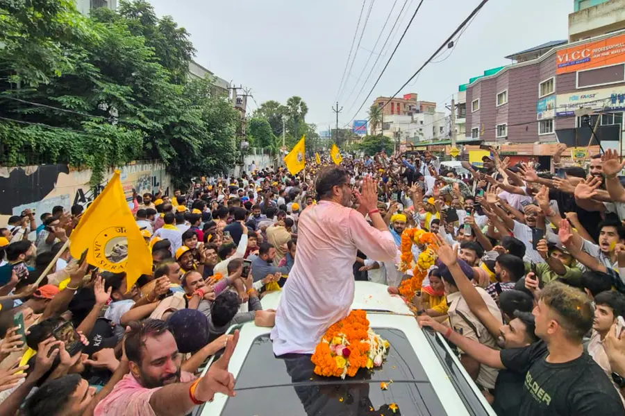 Jan Suraaj Party chief Prashant Kishor celebrates with supporters after taking the lead in the Bankipur Assembly by-election during the counting of votes, in Patna, Bihar.
