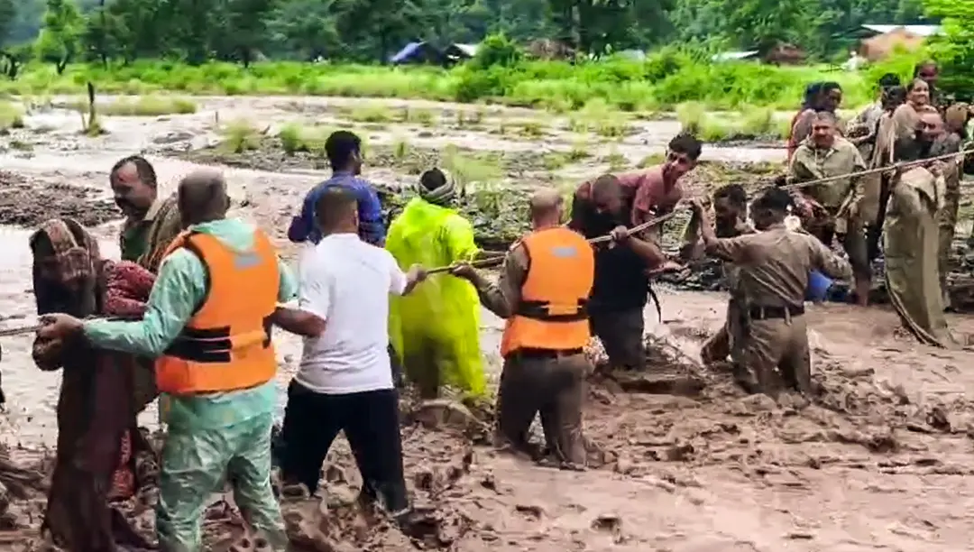 Rescue operation underway using rope-based traverse crossing technique following flash floods and landslides triggered by torrential monsoon rains in HP | ANI