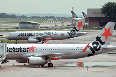 Will you soon have to pay for your cabin bag as Jetstar's new rule could change the way we fly