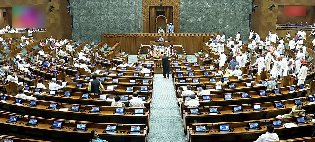 Presiding officer Jagdambika Pal conducts the proceedings of the Lok Sabha during the Monsoon Session of Parliament