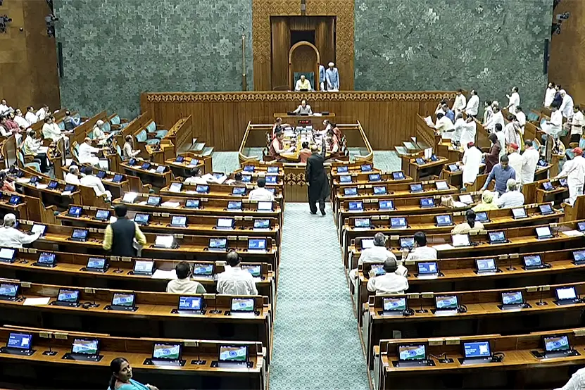 Presiding officer Jagdambika Pal conducts the proceedings of the Lok Sabha during the Monsoon Session of Parliament