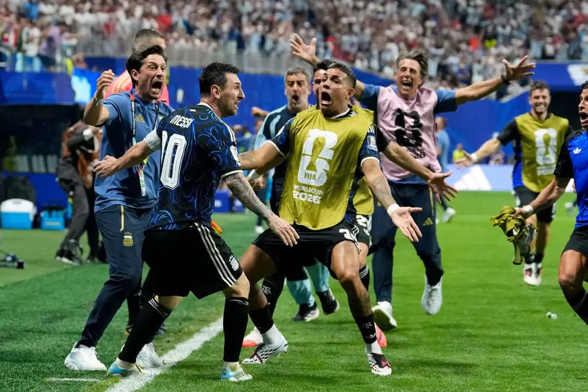 File: Argentina's Lionel Messi celebrates after teammate Lautaro Martinez scored their side's second goal against England | Photo: AP