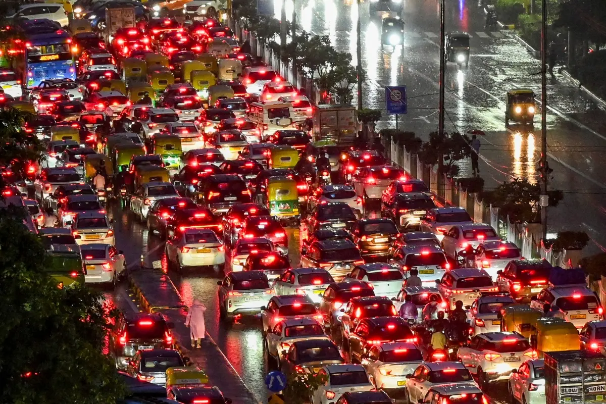 Vehicles stuck in traffic following rainfall, at ITO, in New Delhi.| Photo: PTI