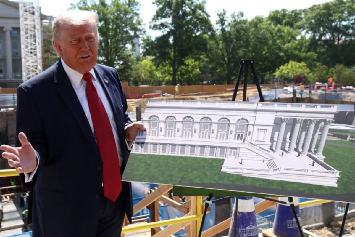 Trump with an illustration detailing White House expansion | Photo: X
