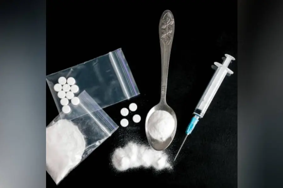 Cocaine allegedly sent as poultry feed to frame a husband; phone records exposed the conspiracy.