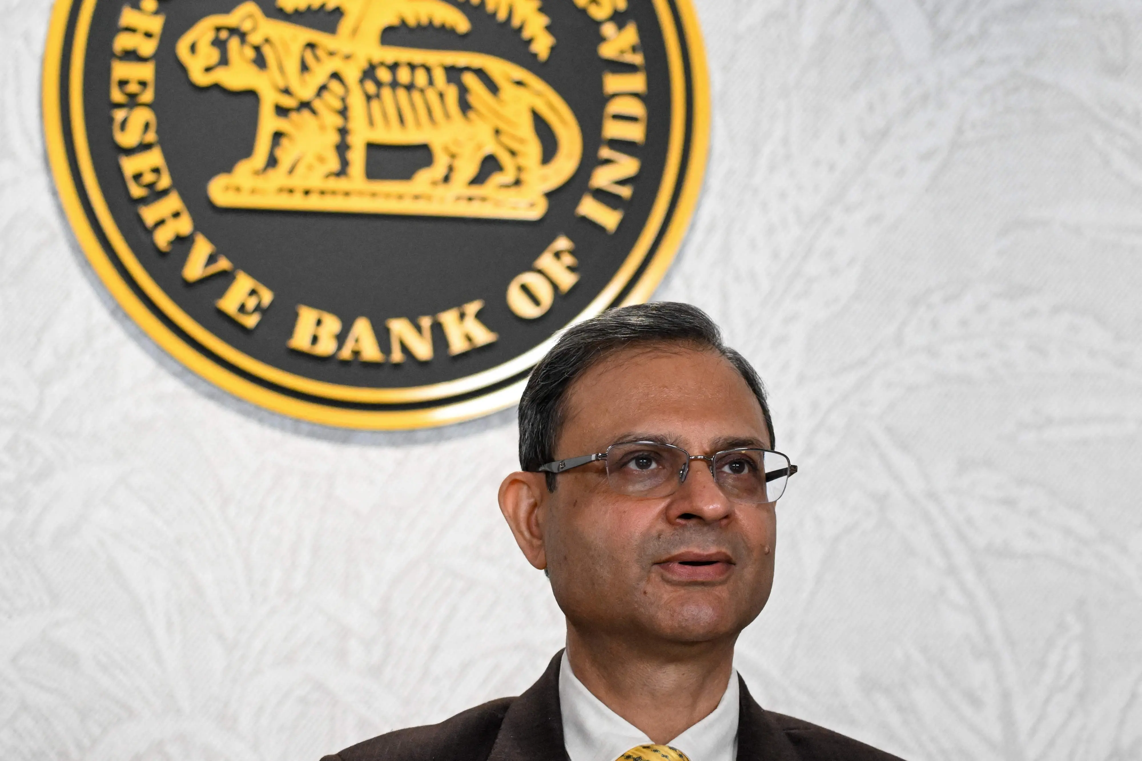 Reserve Bank of India (RBI) governor Sanjay Malhotra speaks during a news conference after the monetary policy review at RBI headquarters in Mumbai | Photo: AFP