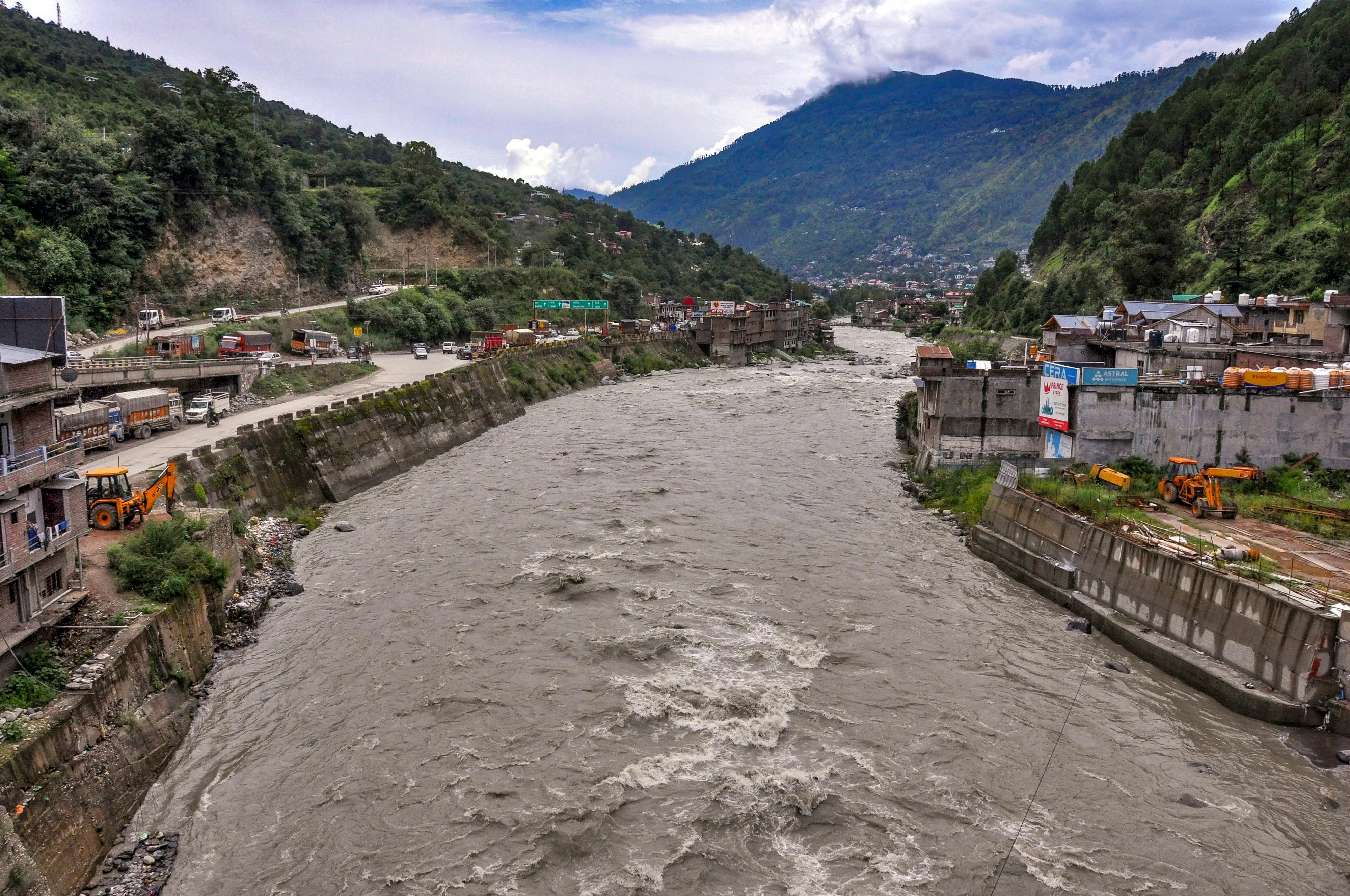 The swollen Beas river flows in spate following incessant monsoon rains, in Kullu, Himachal Pradesh.| Photo: PTI