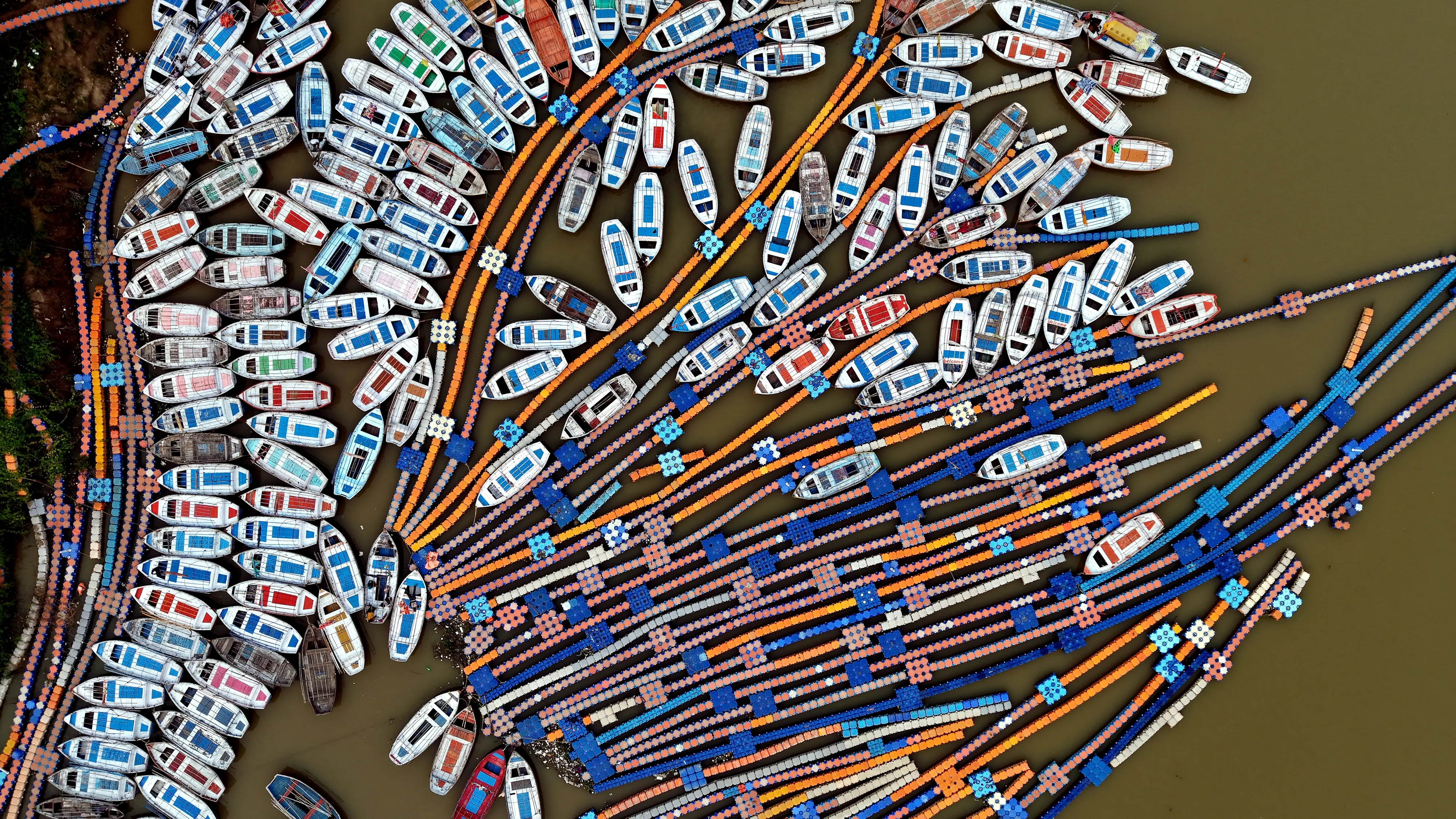 An aerial view of boats anchored at Sangam as the water levels of Ganga and Yamuna rivers rise
