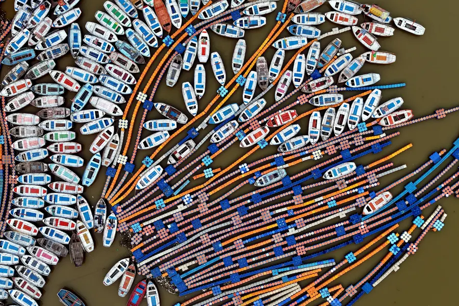An aerial view of boats anchored at Sangam as the water levels of Ganga and Yamuna rivers rise