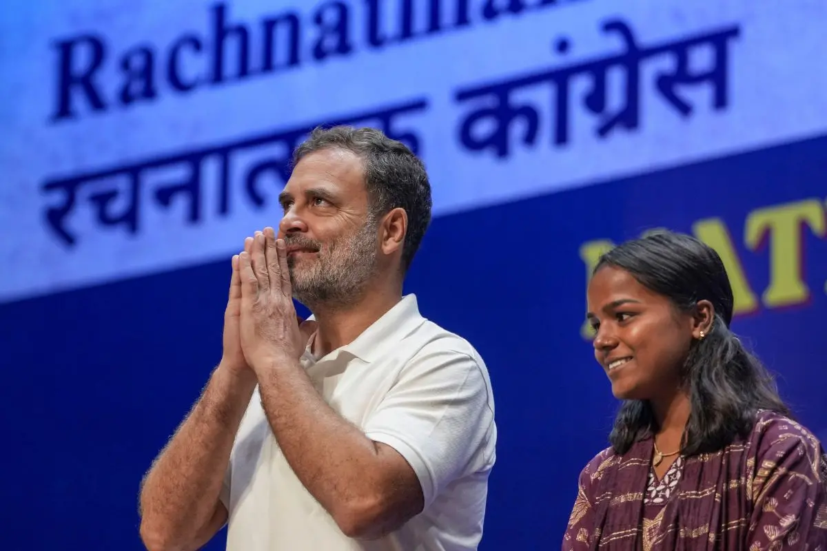 Leader of the Opposition in the Lok Sabha, Rahul Gandhi, with social worker Divya Ahirwar during the 'Rachnatmak Congress National Convention ' at the Constitution Club, in New Delhi, Thursday, Aug. 13, 2026. (PTI Photo/Atul Yadav)