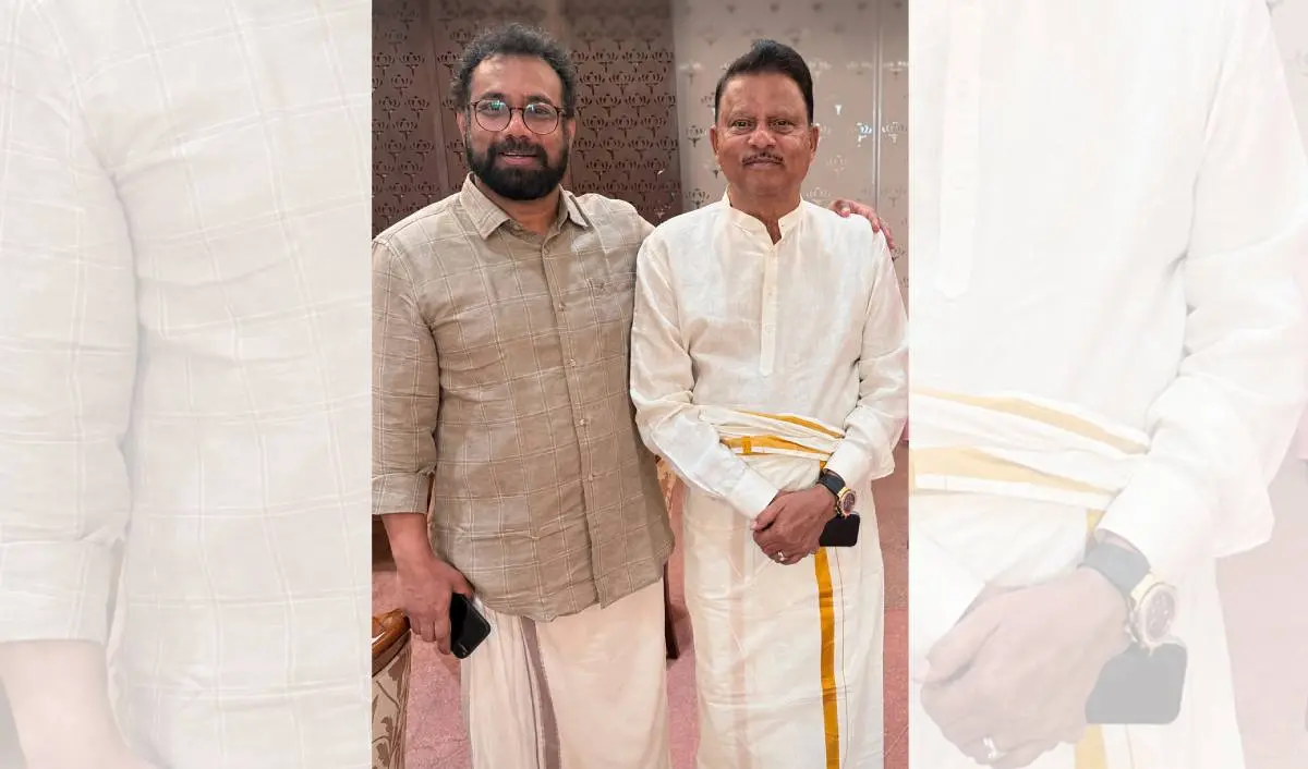 പി.വി. അബ്ദുൾ വഹാബ് ജോൺ ബ്രിട്ടാസിനൊപ്പം