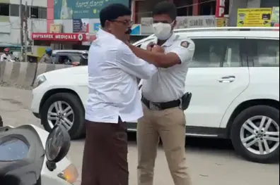 JD(S) leader arrested for allegedly assaulting traffic constable on duty in Bengaluru | WATCH