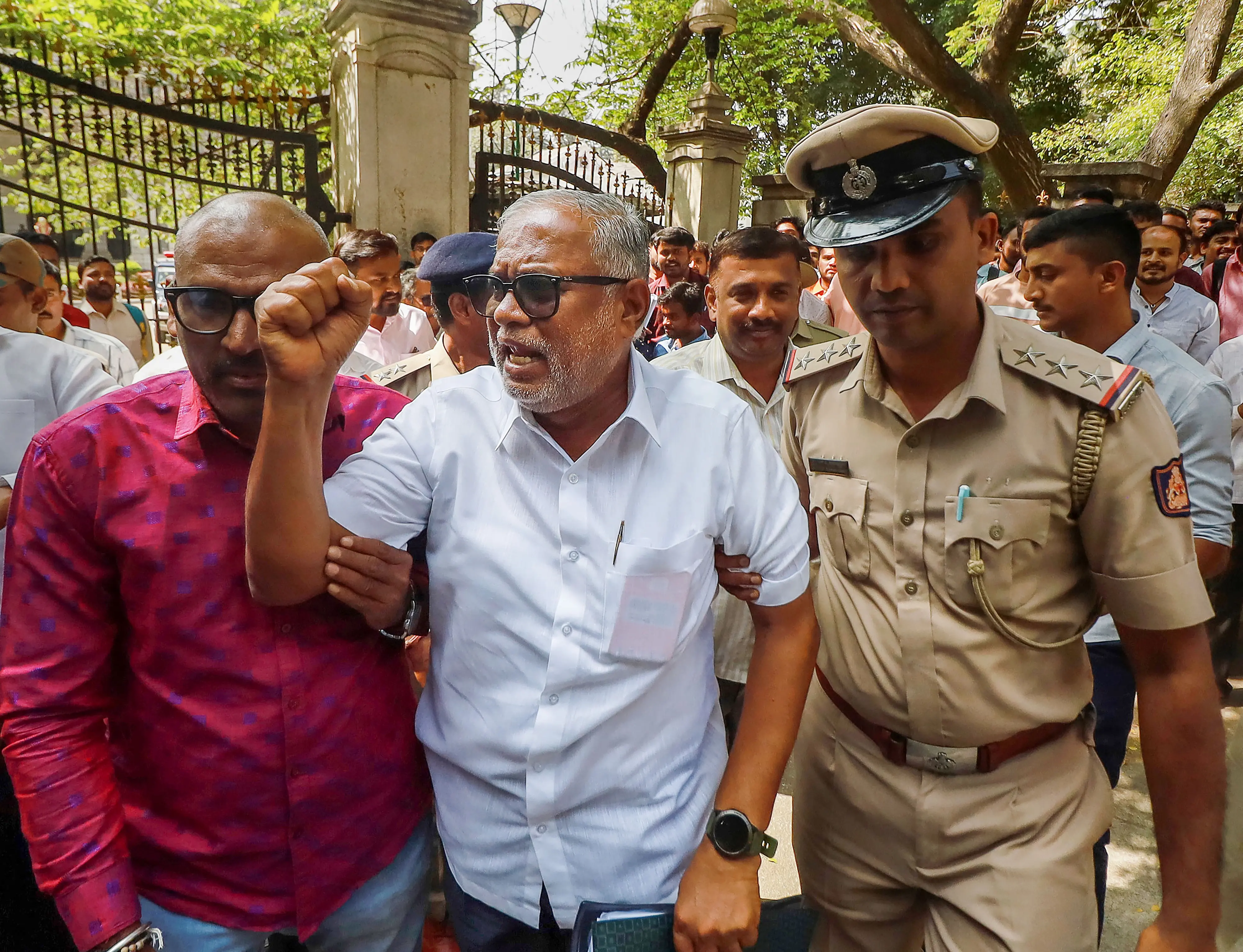 Police detain BJP senior leader and Rajajinagar MLA Suresh Kumar and grauduate students during their protest against the state government over delays in results of Karnataka Public Service Commission (KPSC) exams and various other issues, in Bengaluru.| File image: PTI
