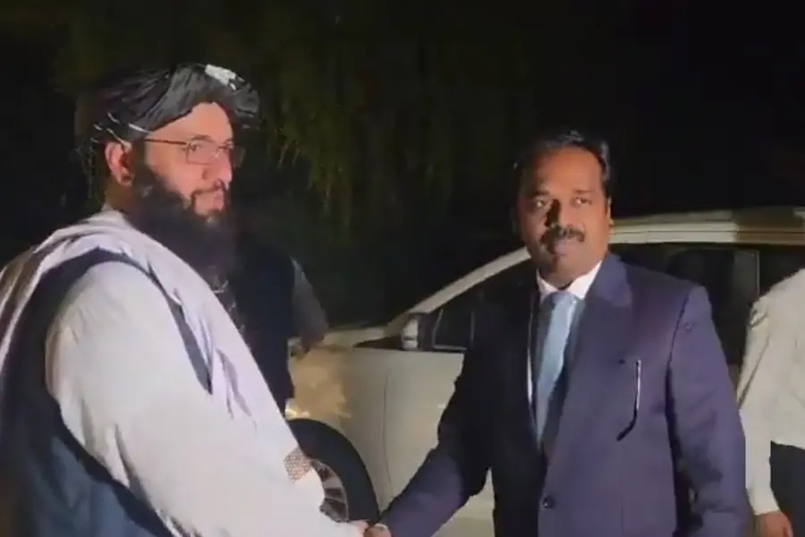 Chargé d'affaires Mufti Noor Ahmad Noor with Joint Secretary (Pakistan, Afghanistan and Iran) Anand Prakash at the embassy