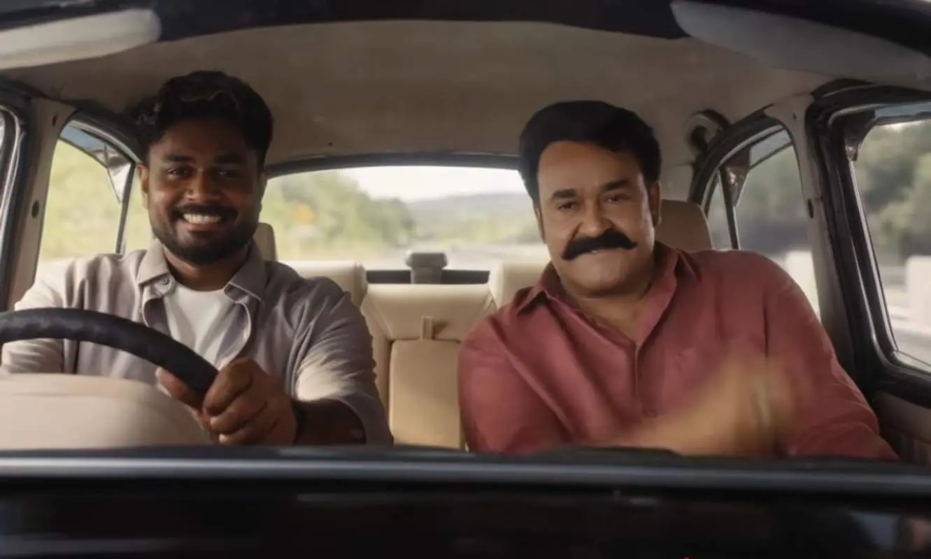 സഞ്ജു സാംസണും മോഹന്‍ലാലും | Photo: youtube/ kcl