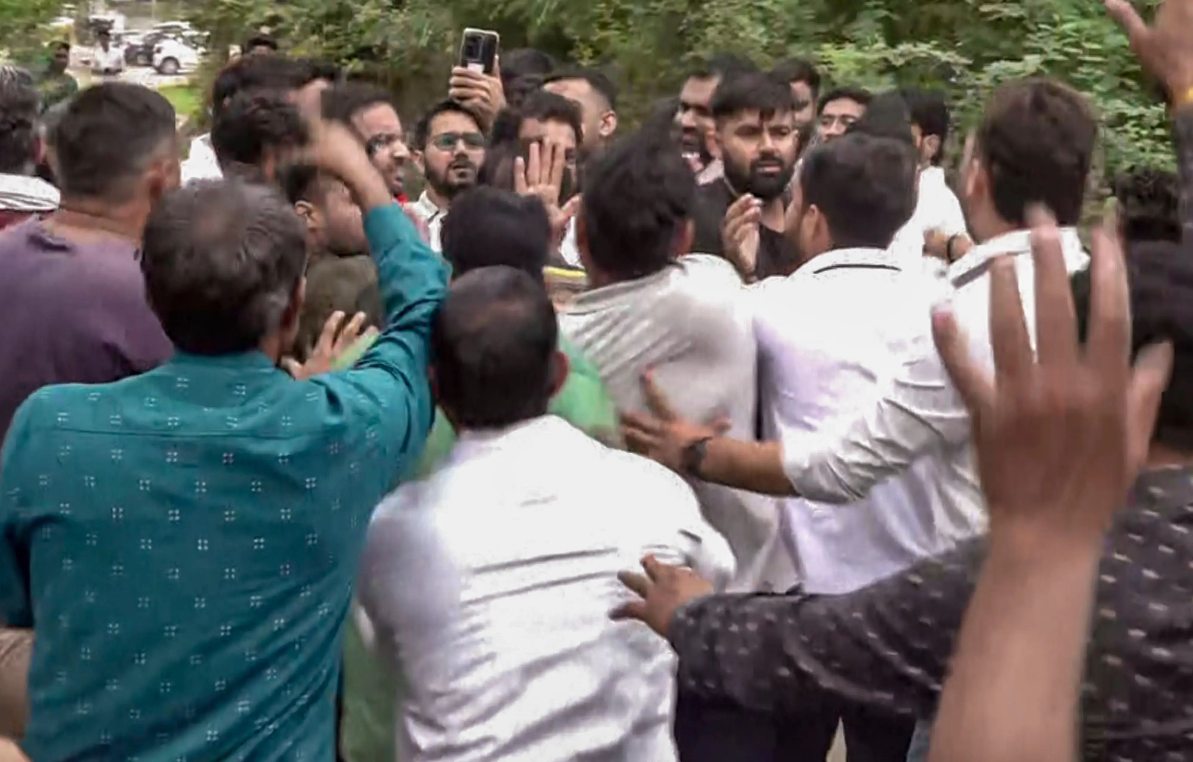 Villagers during a protest against workers of the Cockroach Janta Party (CJP) who tried to visit a government school as part of their 'School Thik Karo' campaign, in Bagru village, Jaipur, Rajasthan.| Photo: PTI
